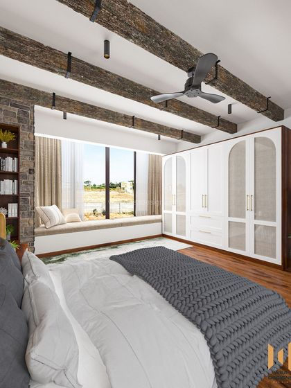 A view from the bed, showing the large window with a cozy built-in seating area, perfect for enjoying the view.