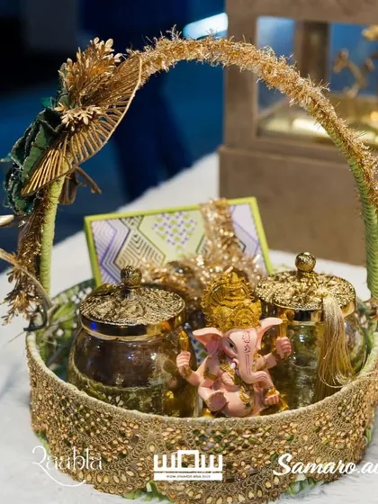 A close-up of one of the hampers on display at the WOW Awards, featuring a Ganesha idol in a beautifully decorated basket.