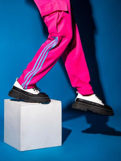 A creative shot focusing on the footwear and the movement of the model. This is a great way to highlight accessories in a campaign.
