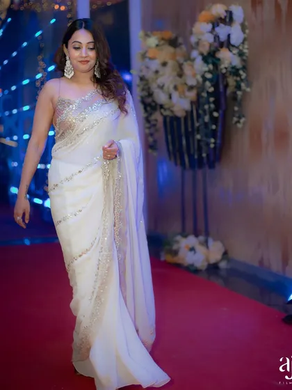 My look for hosting a corporate Diwali Milan for Paras Health. I believe in bringing a festive and glamorous touch to corporate parties, making them feel truly special.