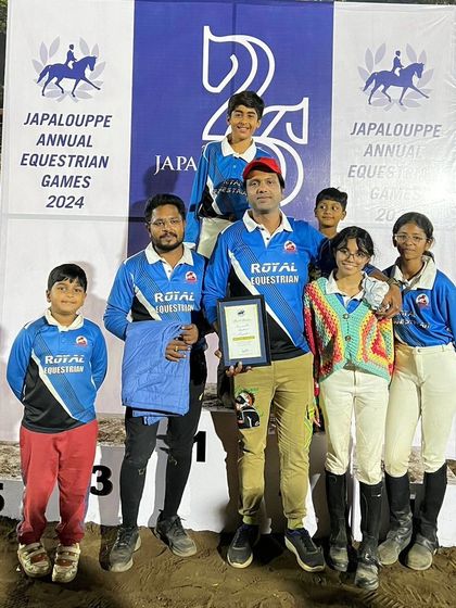 Our team celebrating a successful trip to the Japalouppe Annual Equestrian Games. These events are about more than just winning; they're about building character and creating memories.