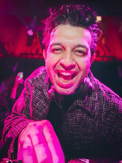 This is me in my element, feeding off the crowd's energy. I'm not just playing songs; I'm right there with you, making sure the party never stops.