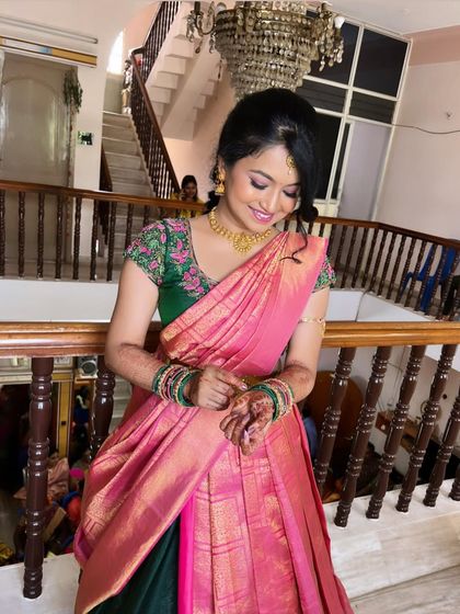 The complete look is perfect for any daytime family gathering or pooja.