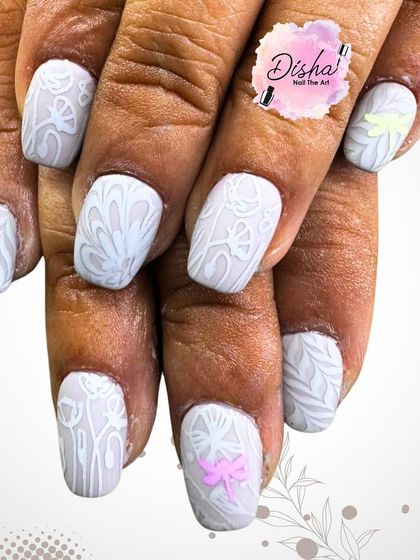 Butterflies adding a touch of elegance. This beautiful design features intricate white patterns on a matte base with tiny butterfly accents.