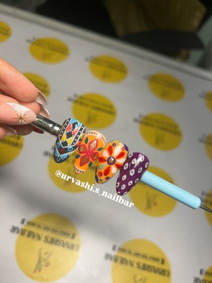 Get ready for garba with these Navratri-themed nails. I hand-painted these with vibrant, intricate patterns inspired by traditional chaniya choli designs to make sure your nails are as festive as your outfit.