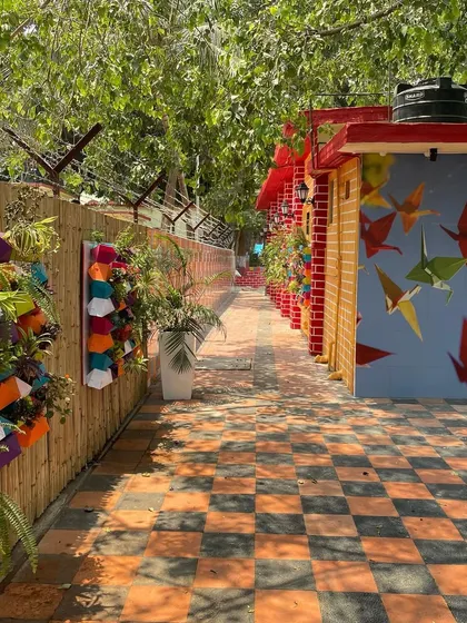 Another creative solution at INS Tanaji, where we used a bamboo fence and colorful wall art with integrated planters to beautify a long boundary wall.