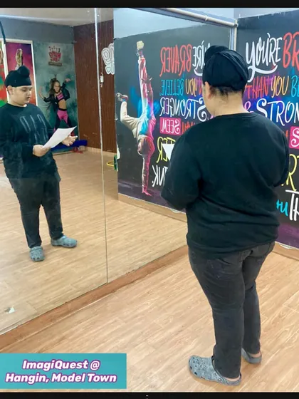 A young actor rehearsing his lines for the Shakespeare stage show. The mirror helps him connect with his character and perfect his delivery, building confidence for the final performance.