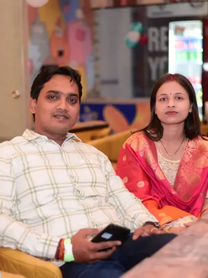 A couple enjoying the party atmosphere from our café seating area.