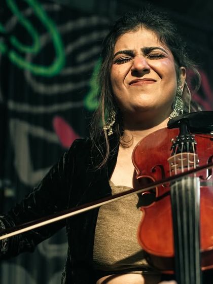 A beautiful, emotional shot of Apoorva Krishna playing her violin in Mumbai. Her performance was a highlight of the final show of our tour.