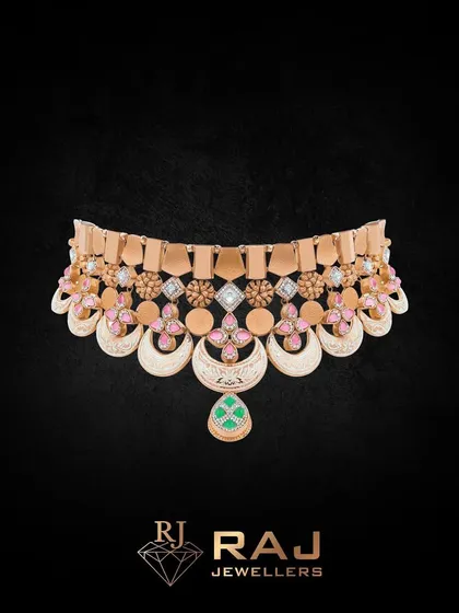 This choker necklace combines modern geometry with traditional motifs, featuring crescent shapes and floral elements accented with pink and green stones. It is a vibrant and festive piece.
