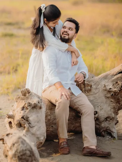 A sweet and spontaneous moment from behind. These unscripted hugs and laughs are what make a pre-wedding session so special.