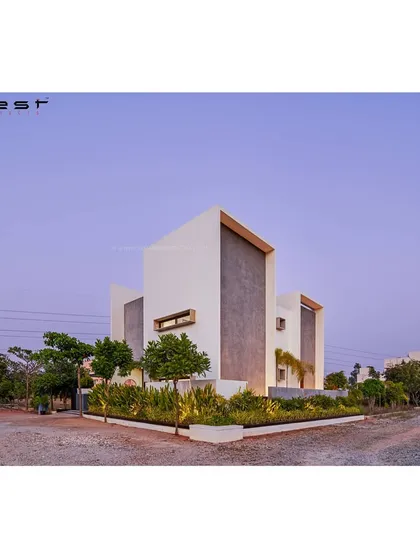 A duplicate of image 164, this photo shows the 'Framed House' at dusk, where its clean, geometric forms are highlighted by subtle architectural lighting.