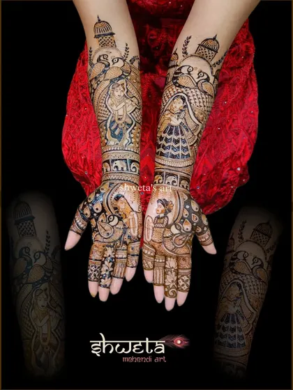 A divine bridal mehendi featuring Radha and Krishna. This design blends spiritual elements with bridal figures, creating a piece that is both beautiful and blessed.