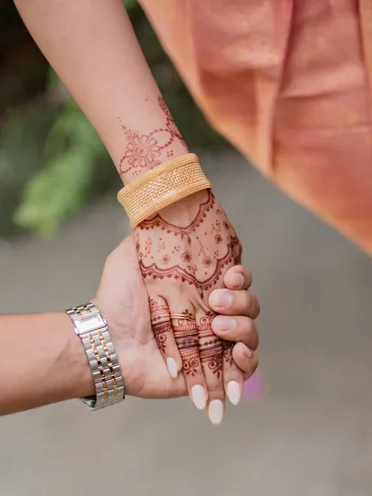 A close-up of the engagement mehendi, showing the delicate details and the beautiful stain. Even simple designs can make a big impact.