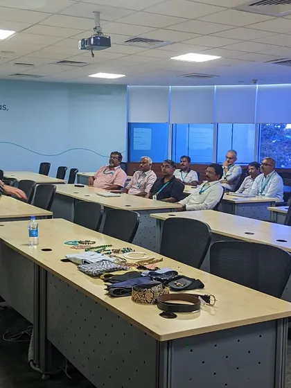 Addressing a group of employees during an Image Management workshop. My sessions are designed to be engaging and informative, providing clear guidance on how to use clothing and body language to build a powerful professional presence.