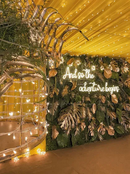 A custom neon sign adds such a fun and personal touch to any event. This "And so the adventure begins" sign became the perfect photo spot for the couple's mehndi and sangeet night.