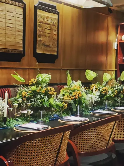 We collaborated with Burma Burma to curate a fine dining experience that reflected their brand's soul. The tablescape features lush, tropical-inspired floral arrangements and custom place settings for an elevated corporate event.