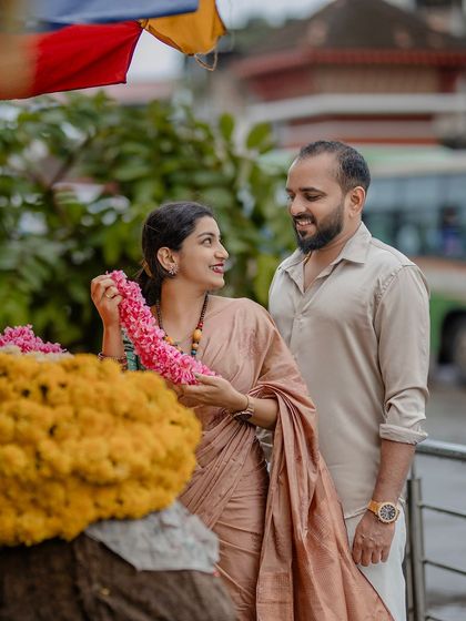 A lovely interaction at a local flower market. This adds a vibrant, cultural element to their urban love story.