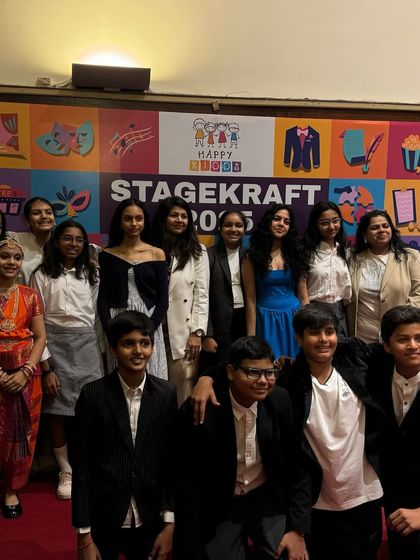 The entire cast and crew of our senior production pose for a photo, celebrating their successful show.