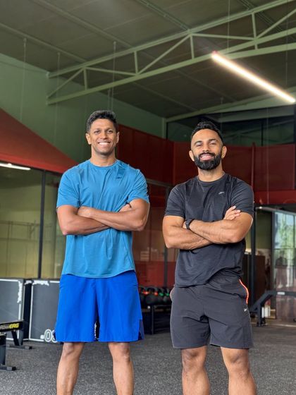 Standing with a partner at our new Bengaluru location. Building a strong team is crucial, and I'm excited for the new transformations we'll create here.