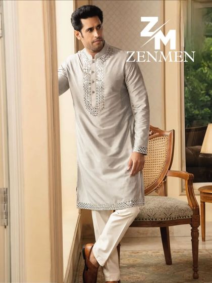 Another pose in the grey silk and mirror work kurta. This look is ideal for a sangeet or a festive daytime event where you want to catch the light.