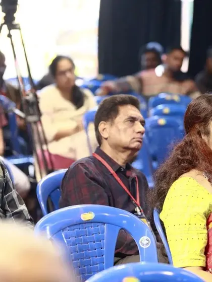 The audience, including myself and other speakers, listening intently during a presentation at the Dhaatu International Puppet Festival. These sessions are a wonderful learning opportunity for everyone.