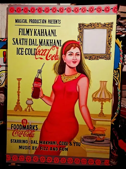The full view of the custom Coca-Cola poster featuring a classic Bollywood-style heroine.
