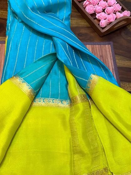 A sky blue and lime green wrinkle crepe Mysore silk saree, perfect for summer events.