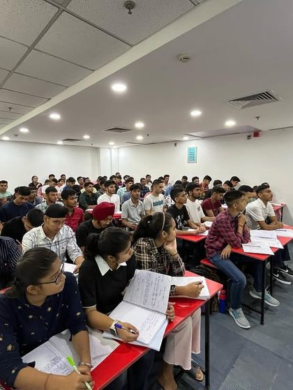 A female instructor leading a class at our Delhi center. Our diverse and experienced faculty is our greatest strength.