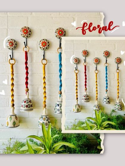 A beautiful display of our best-selling macrame ceramic bells. This image shows a set of five in different colors, each hand-knotted with love and paired with a decorative ceramic hook.
