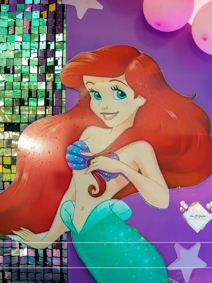 A close-up of the Little Mermaid, Ariel, against a shimmering sequin backdrop. This detail from a mermaid pool party shows the high-quality props I use to bring themes to life.