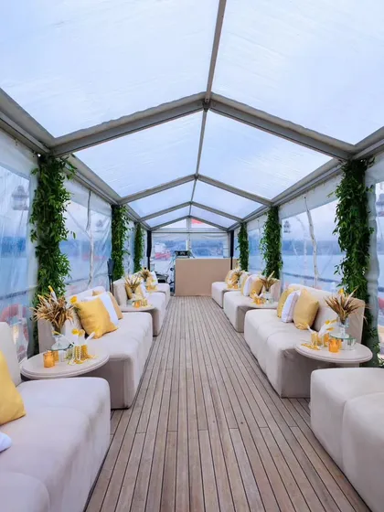 A chic lounge setup on the Halas Boat in Istanbul. We transformed this vessel into a luxurious party space with a clear-top tent, allowing guests to enjoy the views in complete comfort.