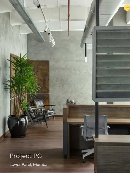 For 'Project PG' in Lower Parel, we embraced the building's industrial heritage. The design features exposed ceilings and concrete walls, balanced by warm wooden floors and partitions, creating a workspace that is both raw and refined.