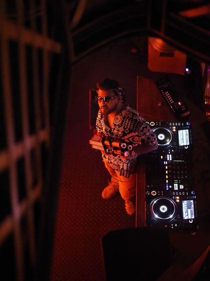 An overhead shot of me at the console, giving a unique perspective of the DJ booth.