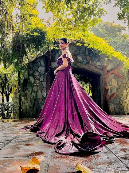 For your pre-wedding shoot or cocktail night, a gown with a long, dramatic trail like this is perfect. I have these in many colors, so you can get that fairytale look for your special event.
