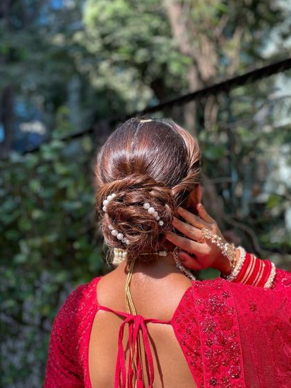 Elegant Bridal Buns & Updos photo 15