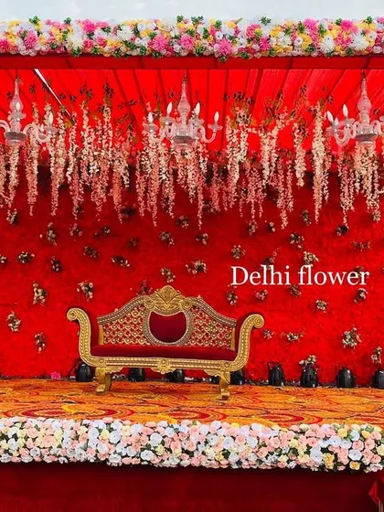 A centered shot of the opulent red and gold stage, perfect for a classic, royal wedding theme.