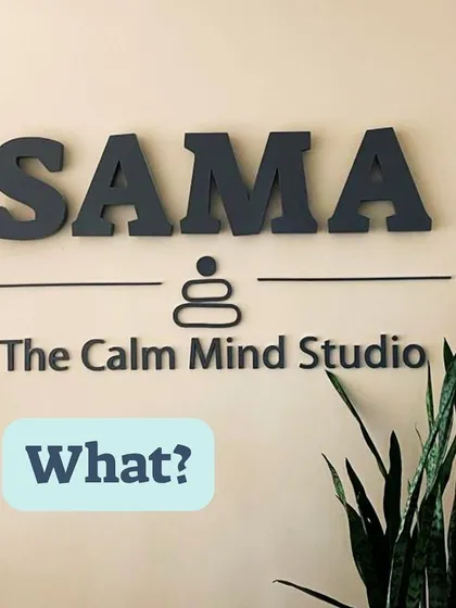 SAMA means a state of balance and tranquility. This image of our studio signage, with its clean lines and calming presence next to a snake plant, reflects the core purpose of our space: to help you find your inner calm.
