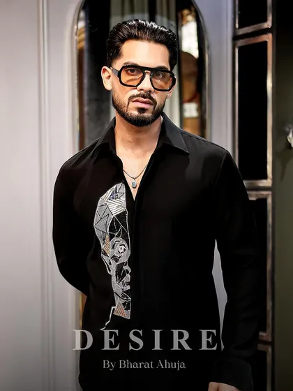 A confident portrait in the abstract face shirt. This is a piece for the man who dares to stand out.