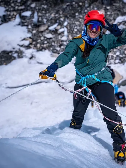 Sreesha Ravindran on the summit of Mt. Everest. Her journey from climbing in Kargil with us to the top of the world is a story of pure determination.