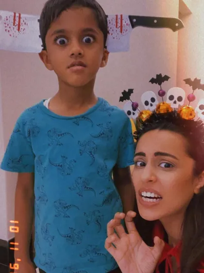 Making spooky faces for our spooky baking session. The fun and silliness are just as important as the baking itself.