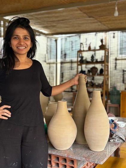 Me with some of my favorite creations. There's nothing quite like the feeling of standing next to large forms that you've shaped from scratch with your own two hands.