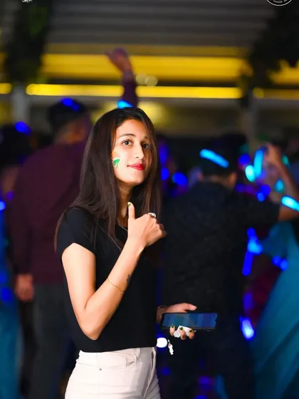 A guest enjoying the glow-in-the-dark theme during a special event night. I can tailor the party's theme to make your celebration unique.