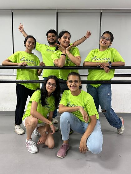Our "RULE Breakers" group posing with their instructors. This team always brings a unique and powerful energy to their performances.
