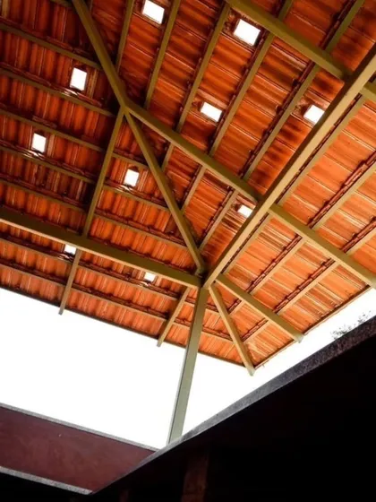 For a more traditional aesthetic, we offer classic tiled roofing for our pergolas. This upward view shows the clean lines of the MS frame combined with terracotta-style tiles that provide excellent weather protection.