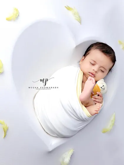 A different angle of this adorable duo, capturing a moment of pure innocence.