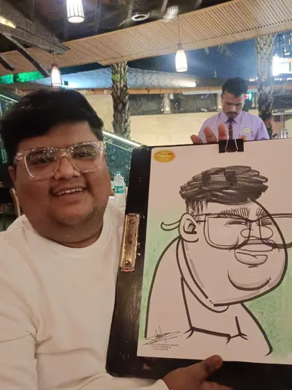 This guest's fun glasses were a central feature of his caricature.