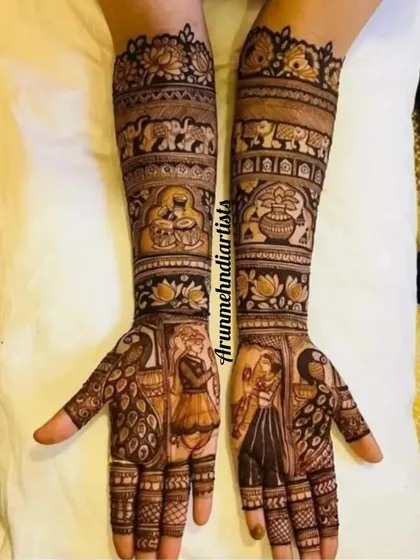 A royal wedding theme, this design features the bride and groom in separate palace windows, surrounded by peacocks, elephants, and intricate jaal work for a majestic feel.