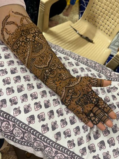 A full-arm design with a mix of traditional and modern elements.