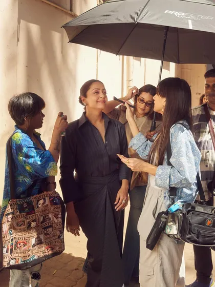 A behind the scenes moment, showing the team at work to ensure every detail is perfect under the sun.